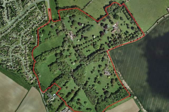 Site set for 210 homes and a public park at Wood Burcote Court Estate
