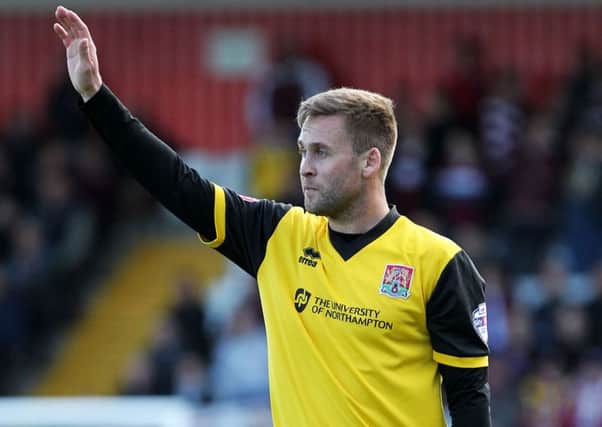 HANDS UP WHO WANTS TO STAY AT THE COBBLERS? - Joel Byrom has signed a new deal at Sixfields