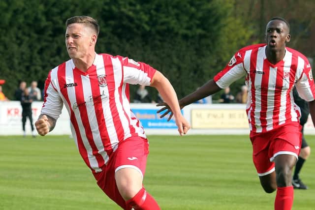 Ryan Rowe celebrates after scoring the goal that kept Brackley in the Conference North. Picture by Steven Prouse