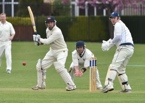 EYES ON THE BALL - ONs' James Mellor square cuts during his innings against Geddington last Saturday (Picture: Dave Ikin)