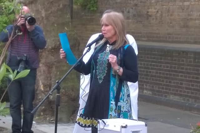 Terry Morley giving her reading at the memorial event