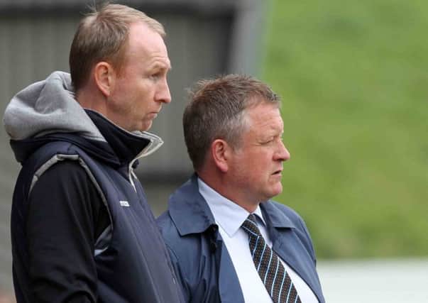 USING THEIR EXPERIENCE - Cobblers boss Chris Wilder and assistant Alan Knill