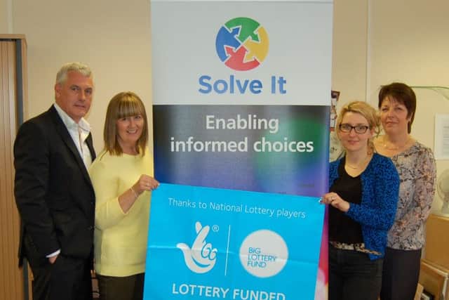 Chair of trustees, Kevin Shapland, with Solve It staff