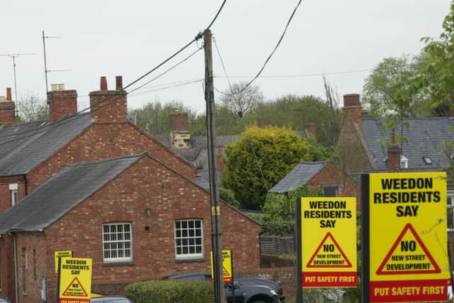 Just a few of the signs up in Weedon