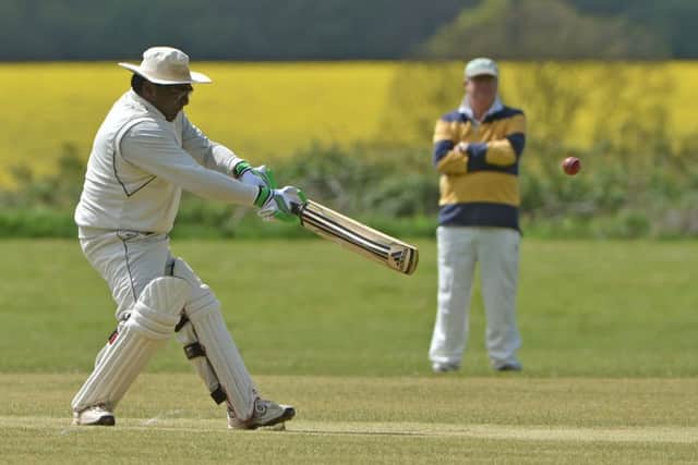 HITTING OUT - action from Mears Ashby IIs clash with Weekley & Warkton IIIs (Pictures: Dave Ikin)