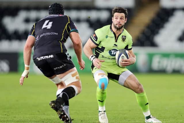 STILL DREAMING - Ben Foden is in with a chance of regaining fitness in time for the World Cup, after suffering a serious knee injury in January (below)