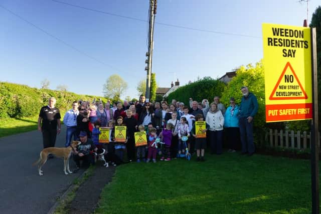 The campaigners and supporters put up signs and posters to highlight their concerns