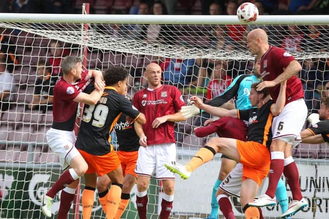 Ryan Cresswell heads home Northampton's second. Picture by Sharon Lucey