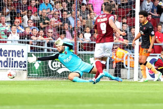 Marc Richards slots home Northampton's third (picture by Sharon Lucey)