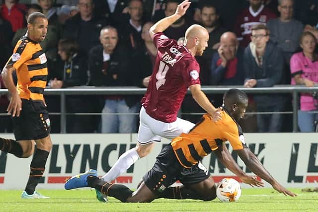 KEY MOMENT - Jason Taylor fouls Barnet's John Akinde to give away a penaty, and get himself sent off