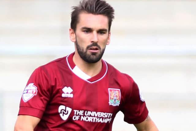 BACK PROBLEM - Cobblers winger Ricky Holmes