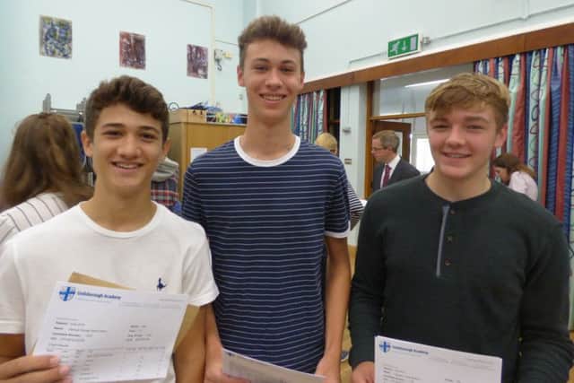 Sam Ward, Matti Ward and Cameron Mabbutt collecting their GCSE results at Guilsborough.