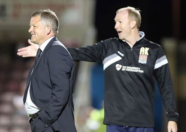 HAPPY WITH WHAT THEY HAVE - Cobblers assistant boss Alan Knill (right) and manager Chris Wilder