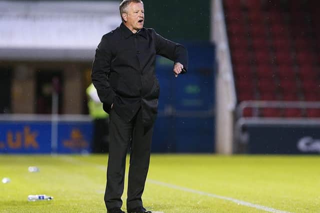 BACK IN THE WINNING ROUTINE - Cobblers manager Chris Wilder watches his team see off Colchester