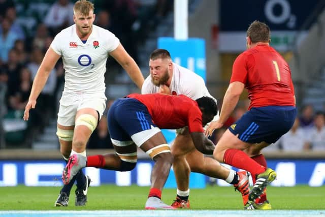 Kieran Brookes (centre) has England duties to attend to before joining Saints