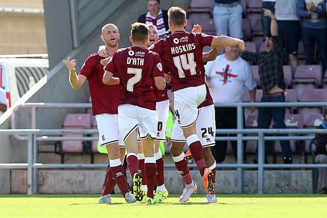 Northampton players celebrate after Sam Hoskins heads them in front