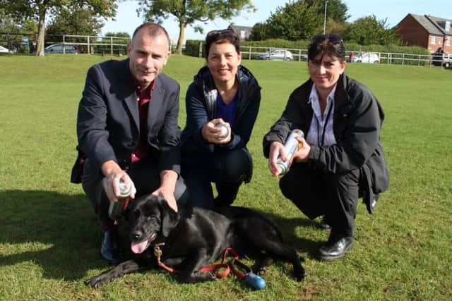 From left: Environmental Health Improvement Manager at Daventry District Council Paul Knight, Cllr Sandra Moxon of Brixworth Parish Council and Lisa Hudson-Fryer from Daventry District Councils Environmental Health Team with Clancy the dog at St Davids Playing Fields in Brixworth.