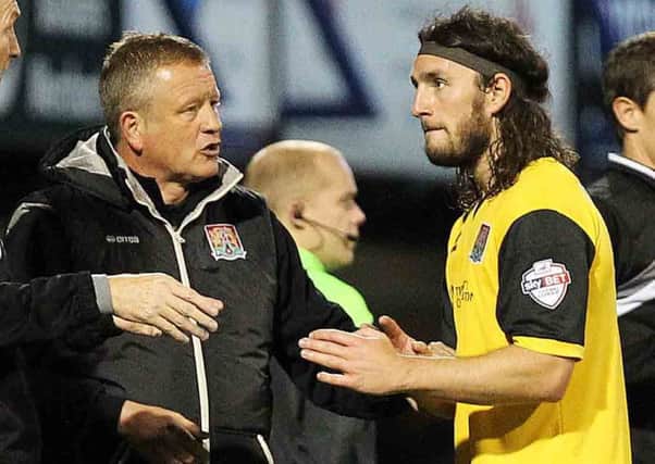 DIFFERENCE OF OPINION - Cobblers manager Chris Wilder (left) and John-Joe O'Toole