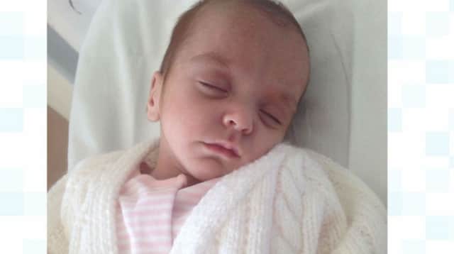 A picture has been released of a baby that was abandoned in a box in Corby