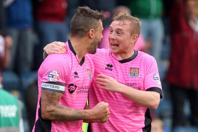 Marc Richards and Nicky Adams celebrate the former's goal on Saturday. Pictures by Sharon Lucey