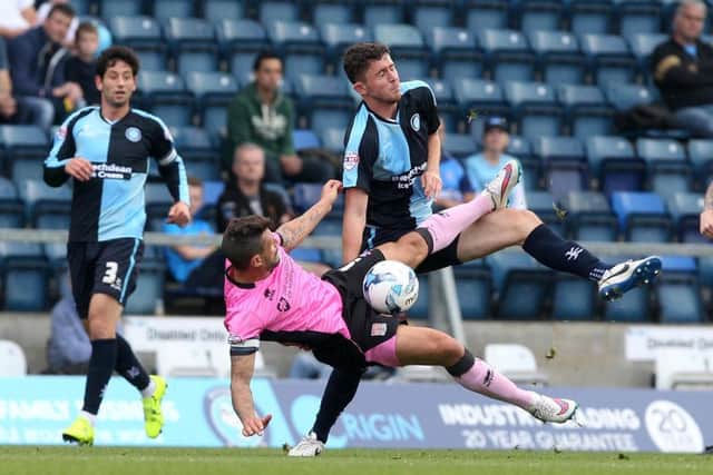 GETTING STUCK IN - Cobblers striker Marc Richards in the thick of the action at Wycombe last Saturday (Pictures: Sharon Lucey)