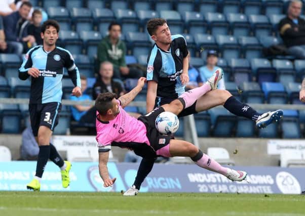 GETTING STUCK IN - Cobblers striker Marc Richards in the thick of the action at Wycombe last Saturday (Pictures: Sharon Lucey)