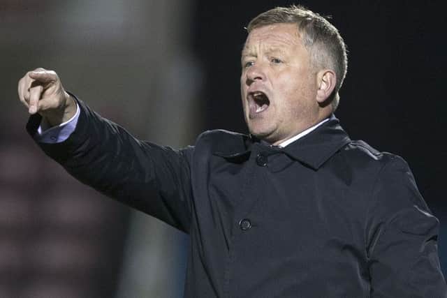 Cobblers boss Chris Wilder shouts out instructions during the win over Carlisle