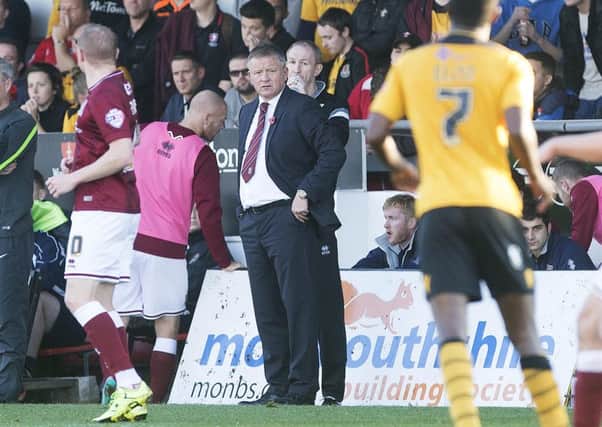 Cobblers boss Chris Wilder watches his team draw 2-2 at Newport County on Saturday (Picture: Kirsty Edmonds)