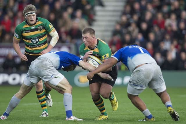 NO WAY THROUGH - Alex Waller gets caught in a Saracens sandwich (Pictures: Kirsty Edmonds)