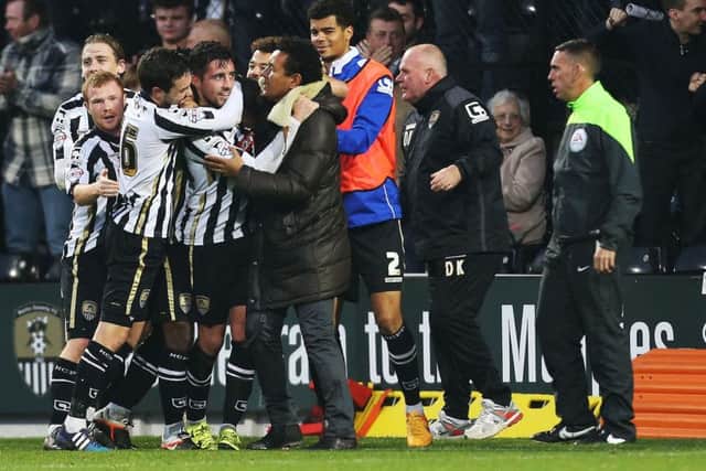 Notts County's players celebrate Alan Sheehan's winning goal in their 2-1 win over Portsmouth last month