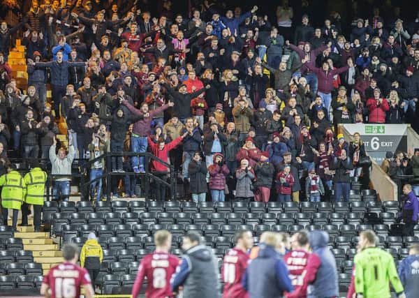 The Cobblers supporters celebrate last Saturday's win at Notts County