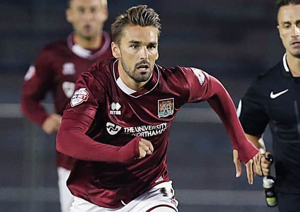 BACK FROM INJURY - Cobblers winger Ricky Holmes