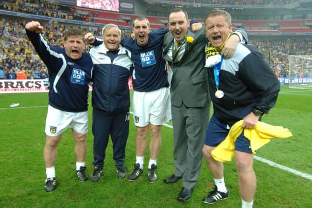 WEMBLEY WINNERS - Kelvin Thomas and Chris Wilder (far right) celebrate Oxford United's promotion to the Football League in 2010, with Alan Hodgkinson (second from left)