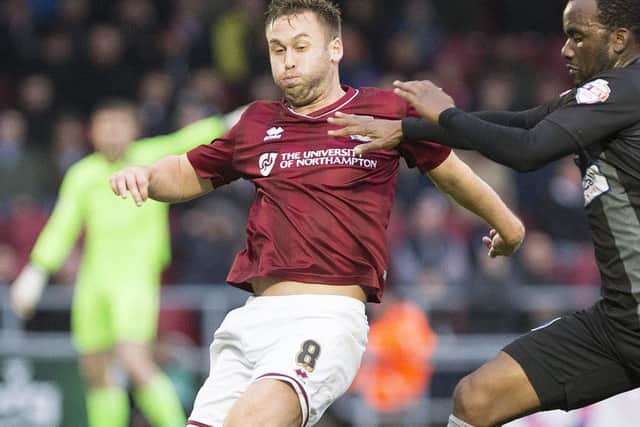 Cobblers midfielder Joel Byrom