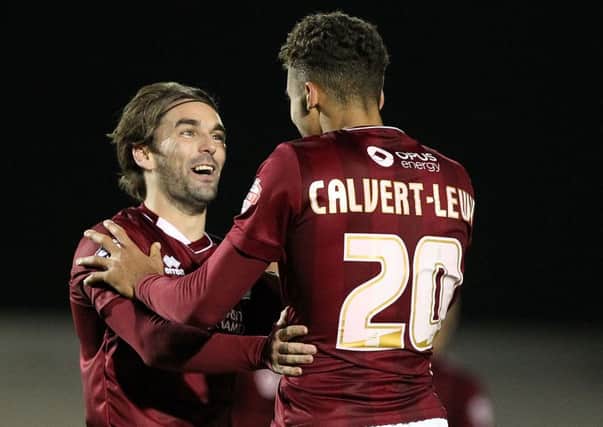 GLAD TO BE BACK - Ricky Holmes enjoys Saturday's win over Northwich Victoria with match-winner Dominic Calvert-Lewin (Picture: Sharon Lucey)