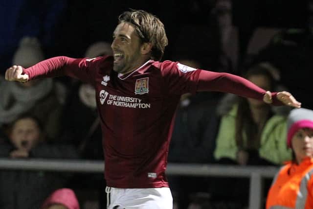 Cobblers winger Ricky Holmes is likely to be on the bench for Saturday's Sky Bet League Two clash against Portsmouth