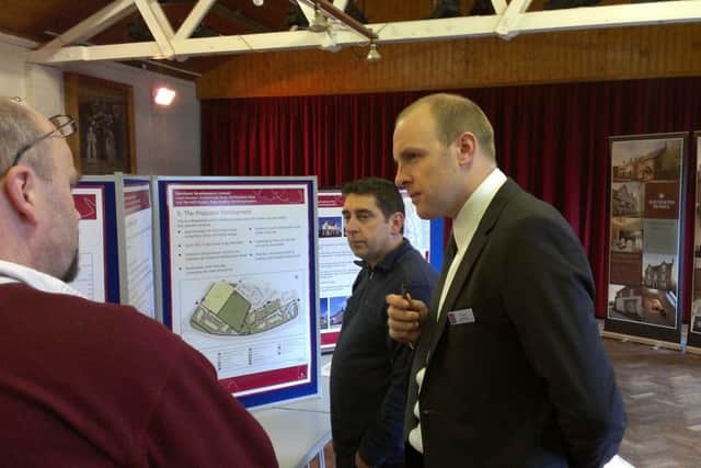 A public meeting at West Haddon Village Hall in 2014 to discuss new homes being put forward by a developer