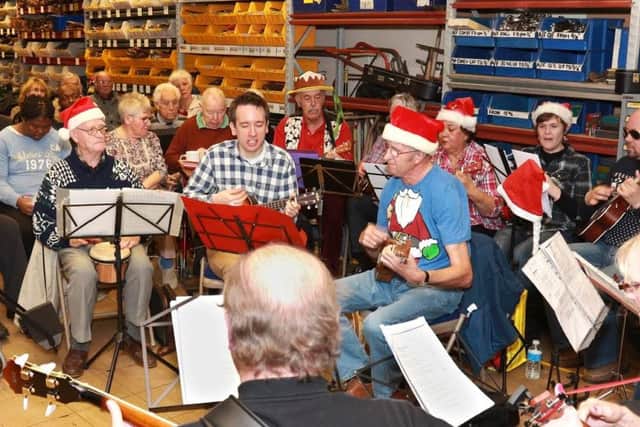 Tools For Self Reliance Christmas party with the Raunds Ukulele Orchestra