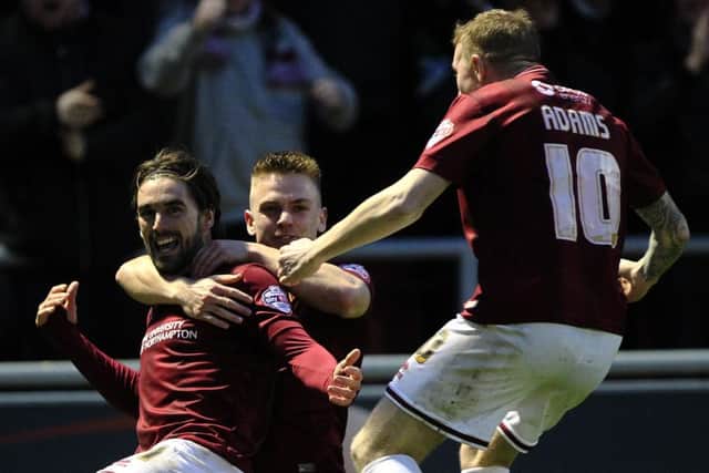 Ricky Holmes celebrates after scoring his and Northampton's second against MK Dons at Sixfields last weekend