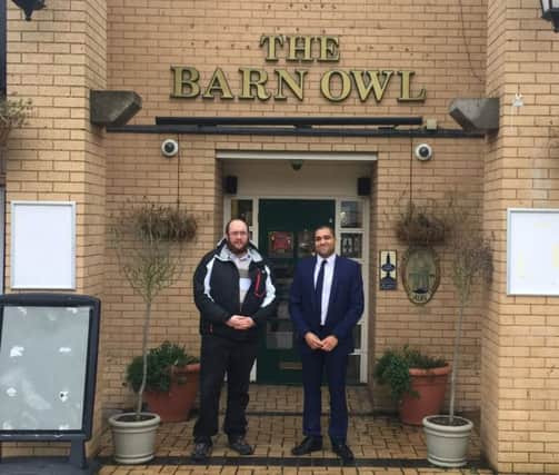Councillor James Hill and Keith Holland-Delamere, chairman of Rectory Farm Residents' Association, outside the Barn Owl, which they are hoping will not be turned into a shop.