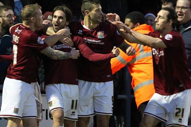 STAR MEN - Nicky Adams, Ricky Holmes, Marc Richards and John-Joe O'Toole are among the players who have enjoyed excellent seasons for the Cobblers