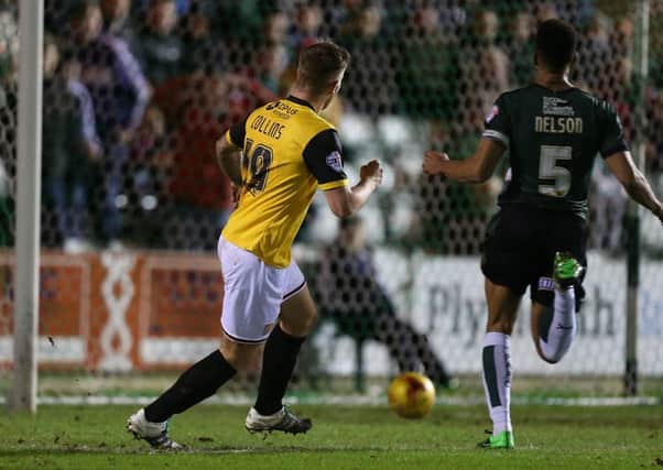 James Collins scores the Cobblers' first goal in their win at Plymouth Argyle (Picture: Pete Norton)