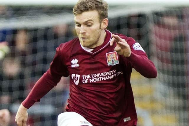 FITNESS FIGHT - Alfie Potter is rated as 'touch and go' to be fit for Tuesday night's FA Cup trip to Milton Keynes Dons
