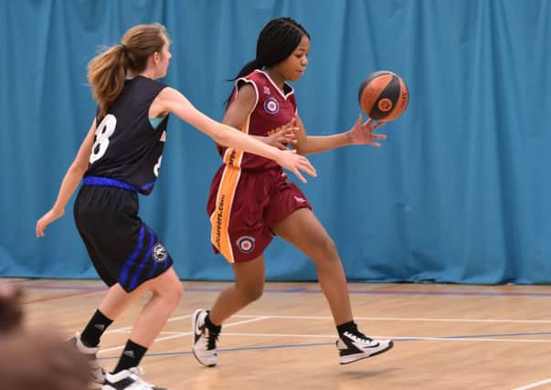 IN CONTROL - action for Northants Lightning Under-14s' win over Oaklands Wolves (Pictures: Dave Ikin)