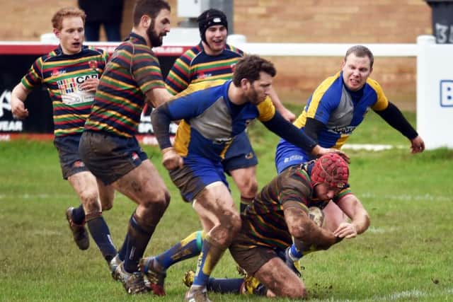 GOING OVER - OId Scouts score a try in their 52-3 win over Matlock last weekend (Pictures: Dave Ikin)