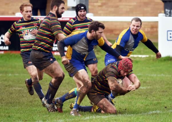 GOING OVER - OId Scouts score a try in their 52-3 win over Matlock last weekend (Pictures: Dave Ikin)