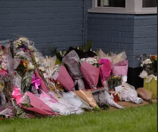 Floral tributes to India Chipchase left outside The Collingtree pub