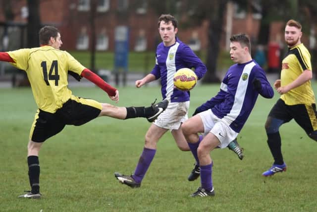 MIDFIELD BATTLE - action from the Sunday Conference clash between Sixfields Reserves and RS15 (Pictures: Dave Ikin)