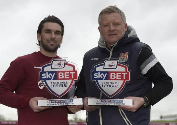 Ricky Holmes (left) and Chris Wilder with their Sky Bet League Two awards