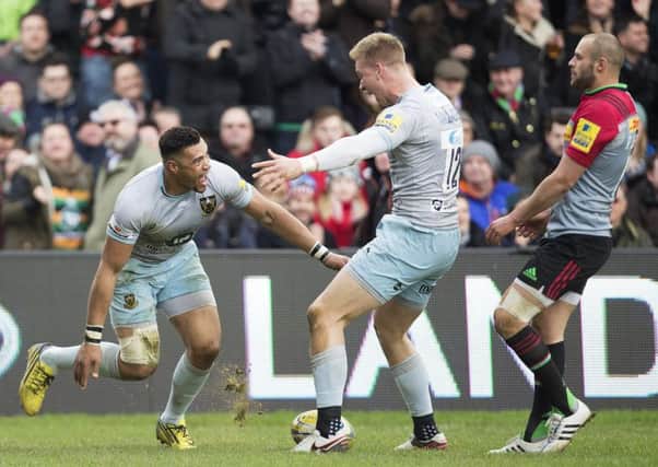 Luther Burrell celebrates scoring his try for Saints against Harlequins (Pictures: Kirsty Edmonds)